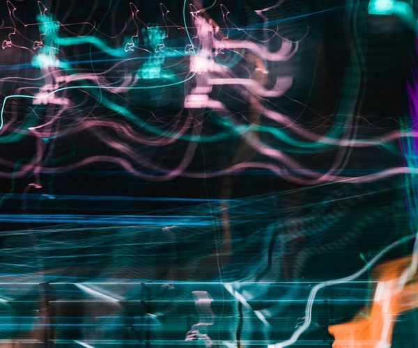 Vibrant cyan light streaks showing movement concept